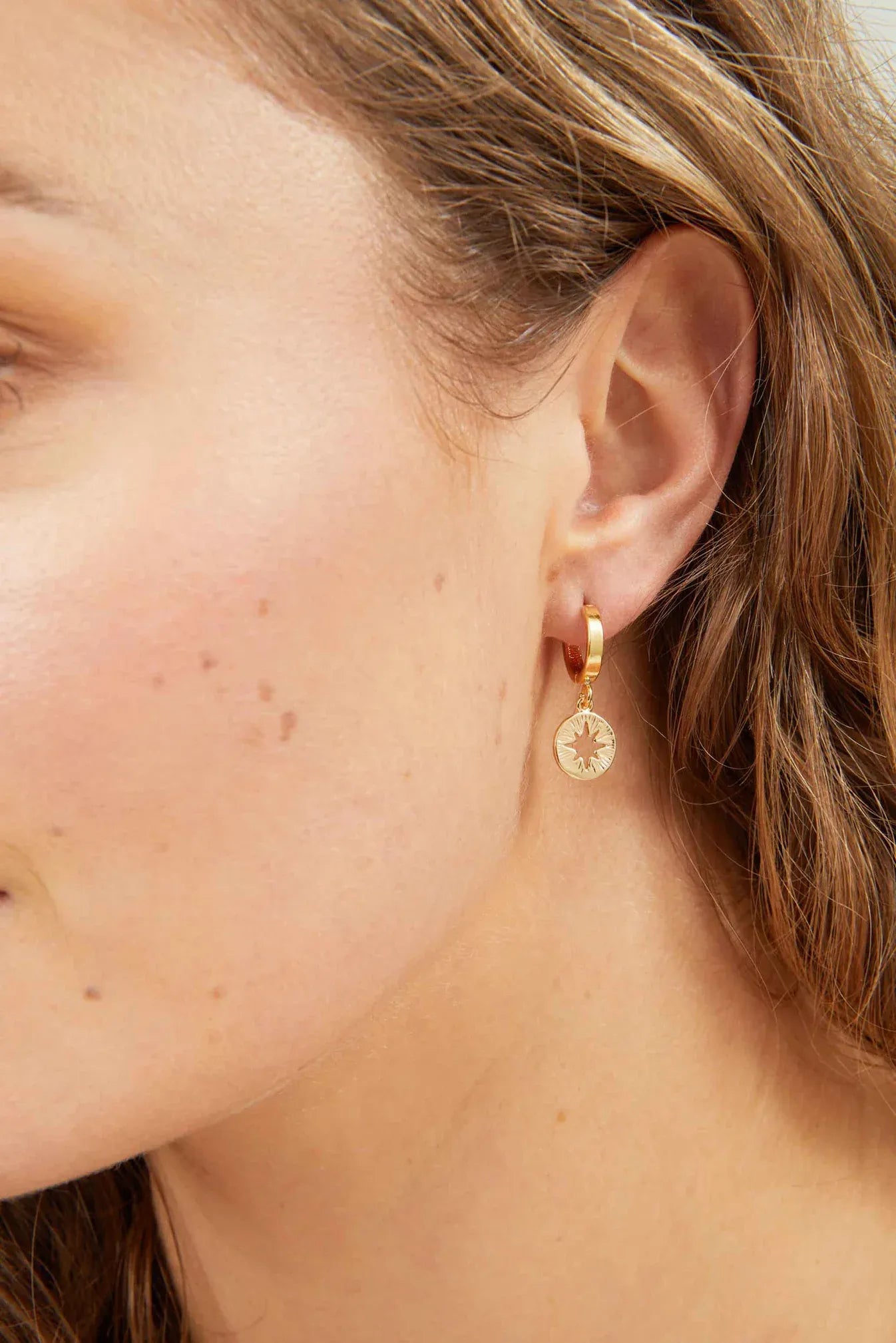Star Huggie earrings