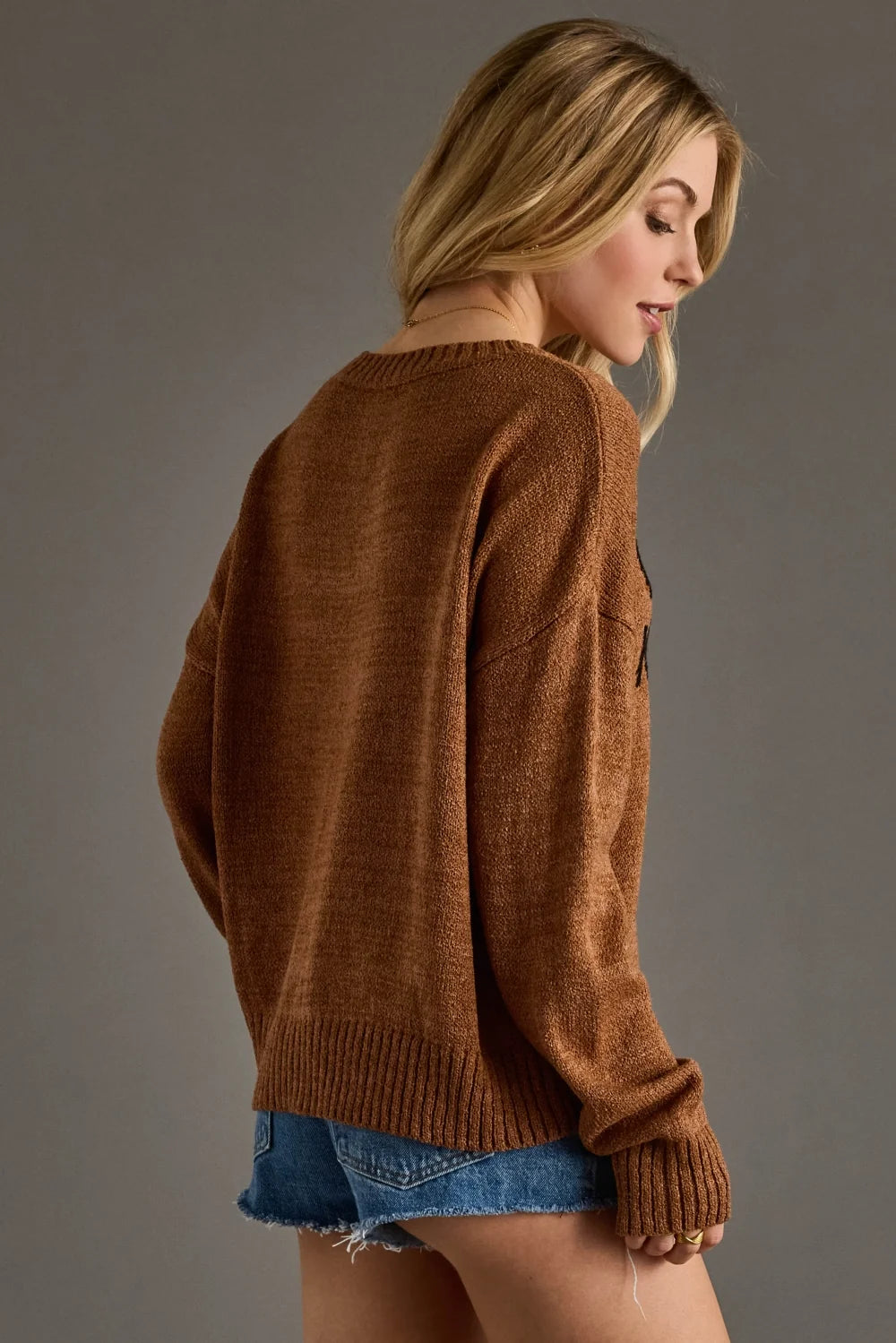 Tobacco brown slogan sweater featuring the Whiskey Weather design with a soft, easy-to-layer silhouette.