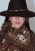 LEOPARD PRINT EMBROIDERED SCARF ON WOMANS NECK