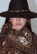 LEOPARD PRINT EMBROIDERED SCARF ON WOMANS NECK