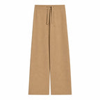 Women's camel wool knit trousers with relaxed fit