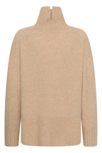 A beige knit turtleneck sweater shown from the back, featuring a ribbed hem and cuffs, set against a plain white background.