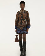 Black baroque print party dress styled with heels for an evening out