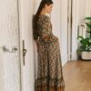 Sabrina Maxi Dress by Jaase featuring a fluid drape, geometric print and elegant V-neckline for effortless occasion styling.