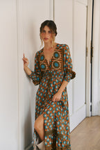 Jaase Bianca Print Sabrina Maxi Dress featuring a bold geometric print in teal, rust, brown and cream tones.