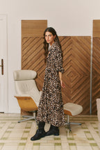 Untamed Sabrina Maxi Dress by Jaase with bold animal print, V-neckline and tiered maxi-length skirt.