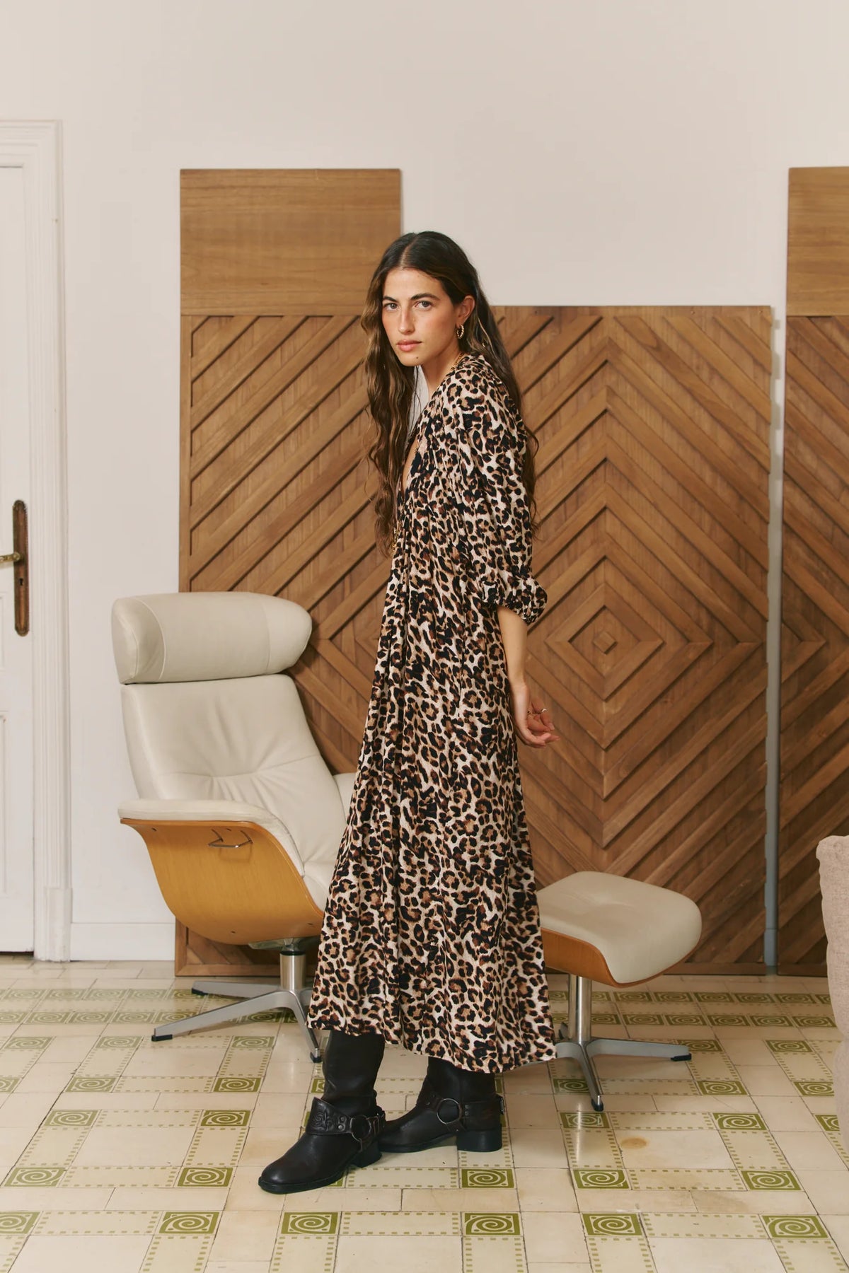 Untamed Sabrina Maxi Dress by Jaase with bold animal print, V-neckline and tiered maxi-length skirt.